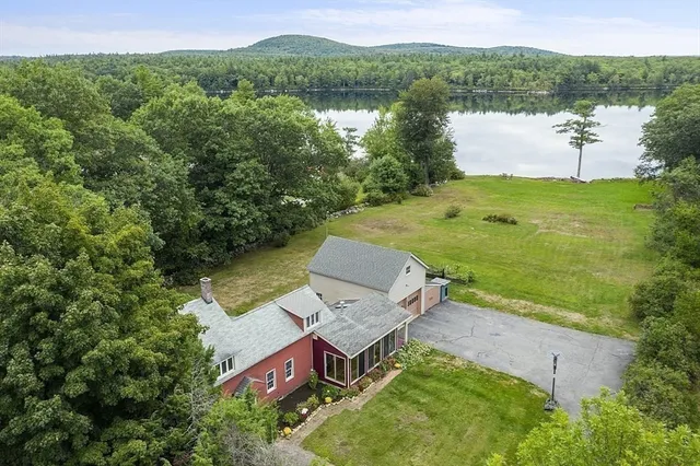 an aerial view of a house with garden