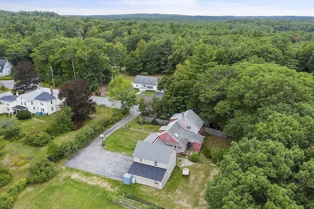 a bathroom with a sink toilet tub and shower