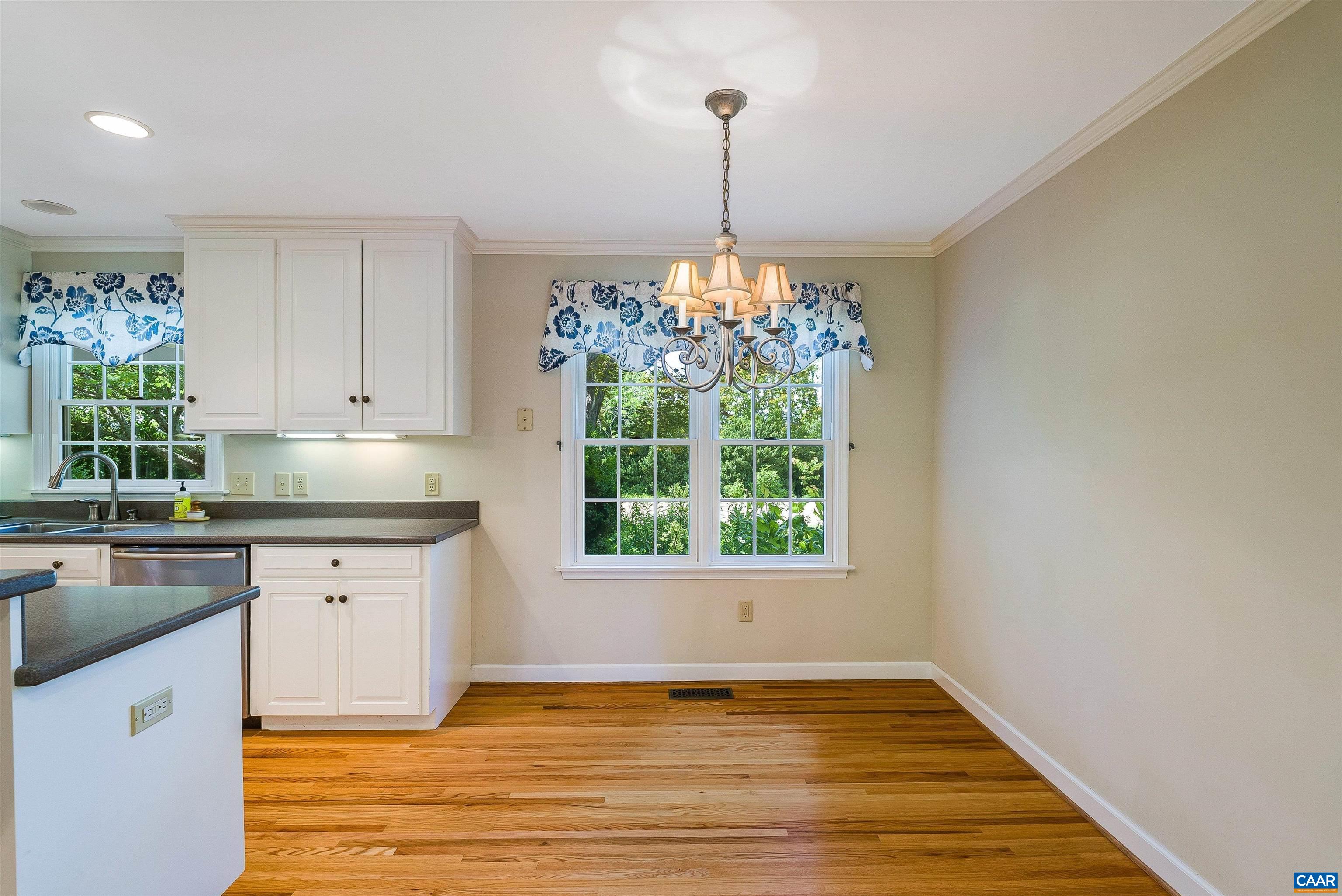 1571 Duke Road Waynesboro, VA 22980 - Photo 11 of 75 a kitchen with kitchen island granite countertop a stove a sink a counter space and refrigerator