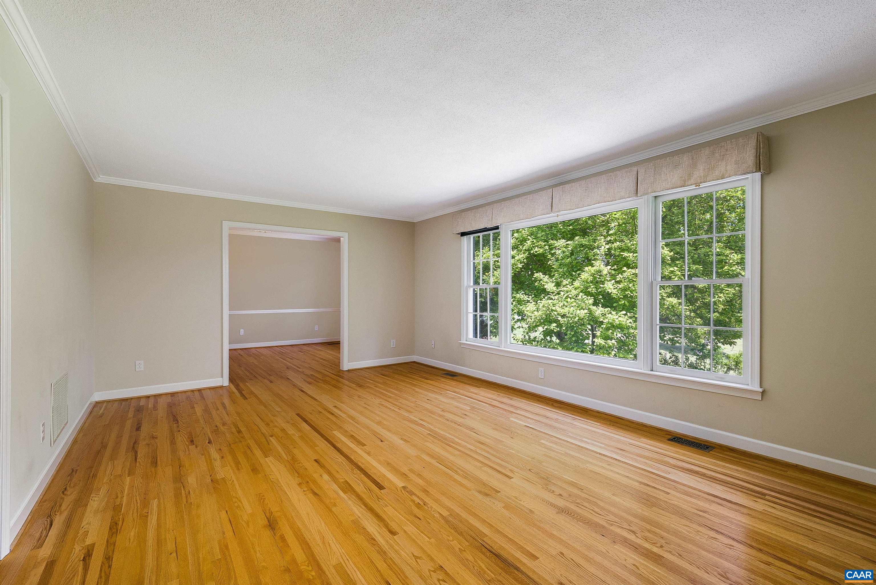 1571 Duke Road Waynesboro, VA 22980 - Photo 17 of 75 a view of empty room with wooden floor and fan