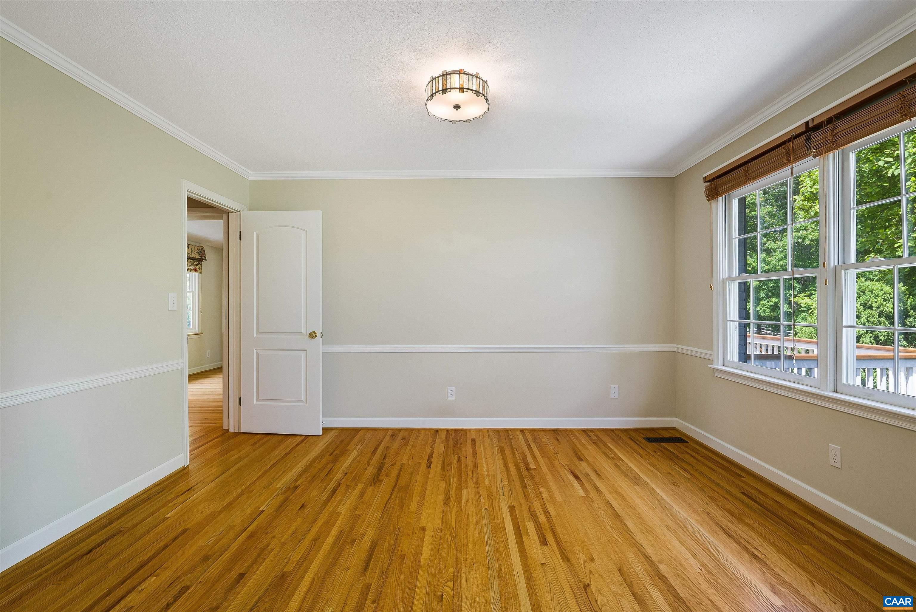 1571 Duke Road Waynesboro, VA 22980 - Photo 19 of 75 an empty room with wooden floor and windows