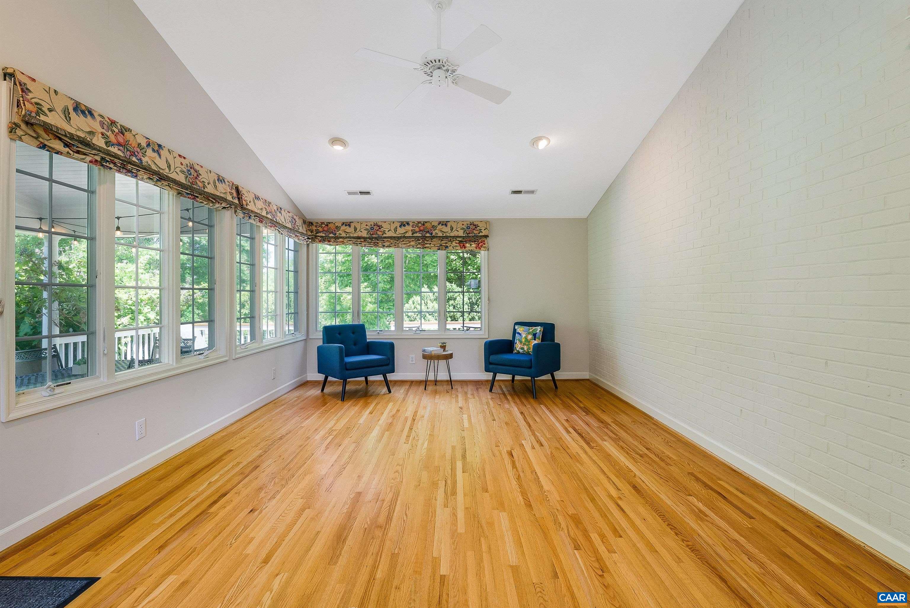 1571 Duke Road Waynesboro, VA 22980 - Photo 22 of 75 a view of an empty room with wooden floor and a window