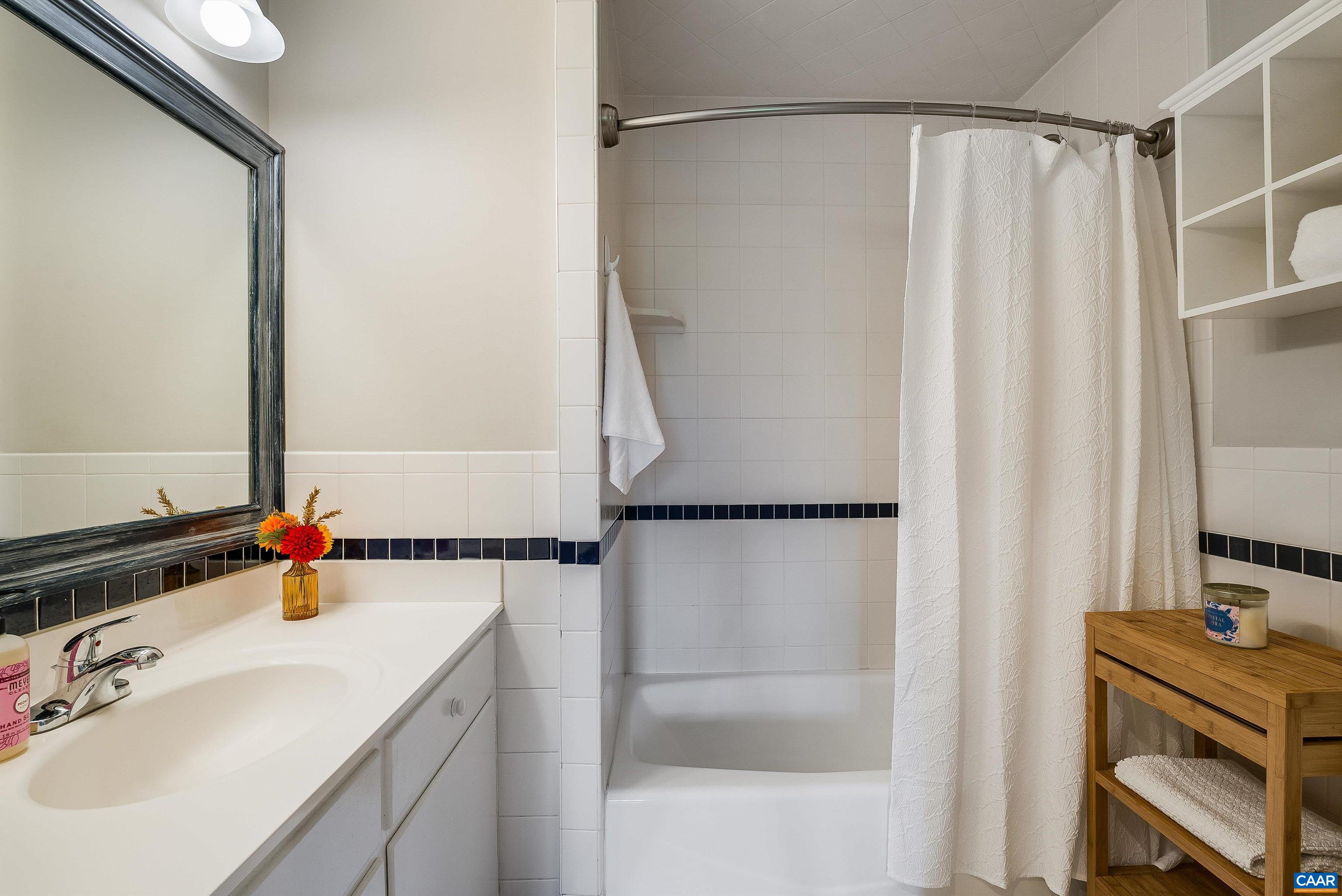 1571 Duke Road Waynesboro, VA 22980 - Photo 34 of 75 a bathroom with a sink and a mirror