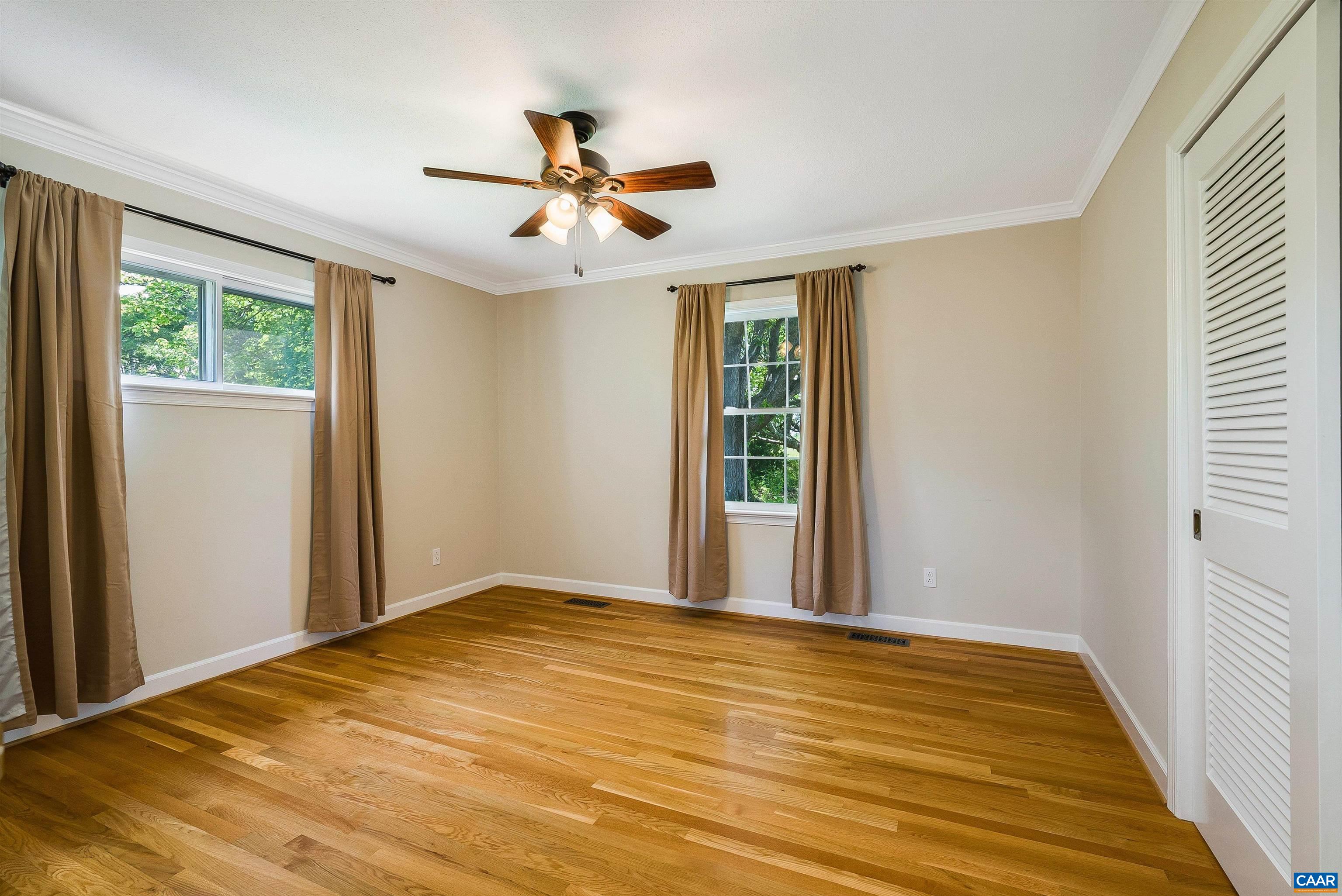 1571 Duke Road Waynesboro, VA 22980 - Photo 35 of 75 a view of empty room with wooden floor and fan