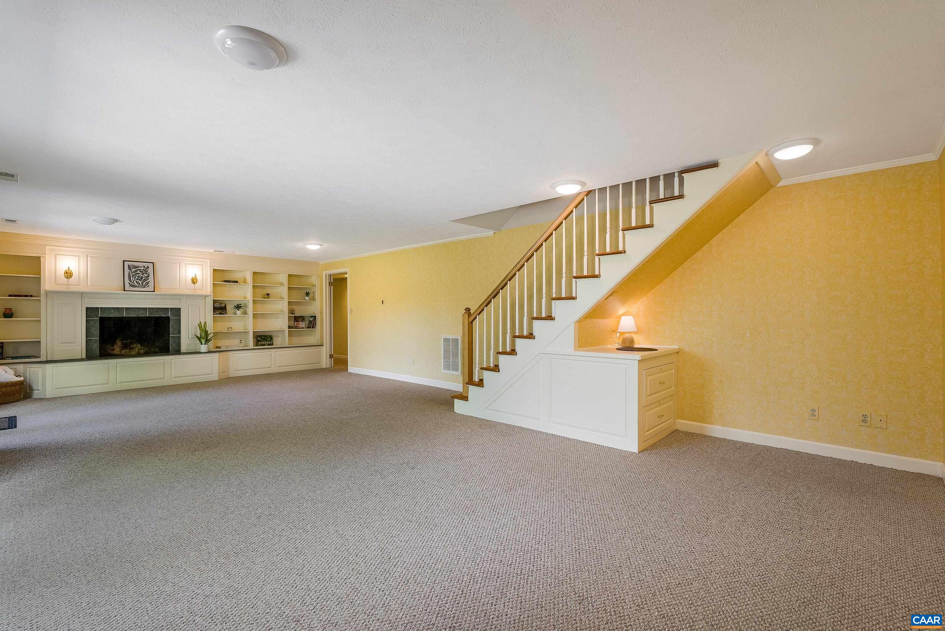 1571 Duke Road Waynesboro, VA 22980 - Photo 38 of 75 a view of an empty room with fireplace and a window