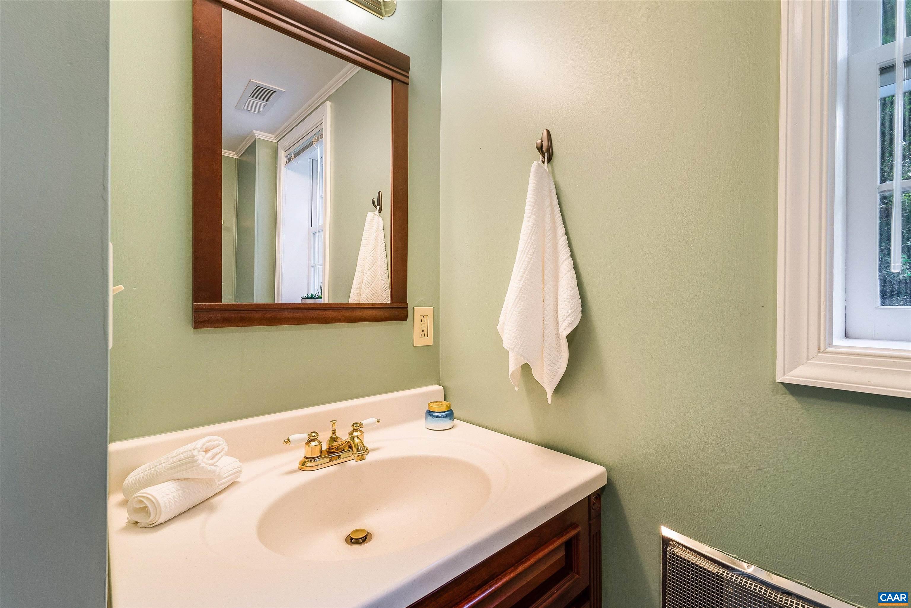 1571 Duke Road Waynesboro, VA 22980 - Photo 46 of 75 a bathroom with a sink and a mirror