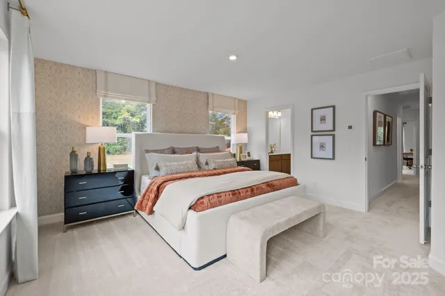 a bedroom with bed and window