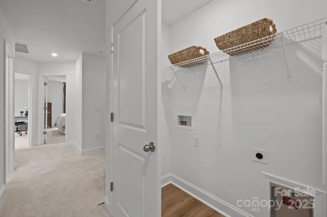 a view of a hallway with closet