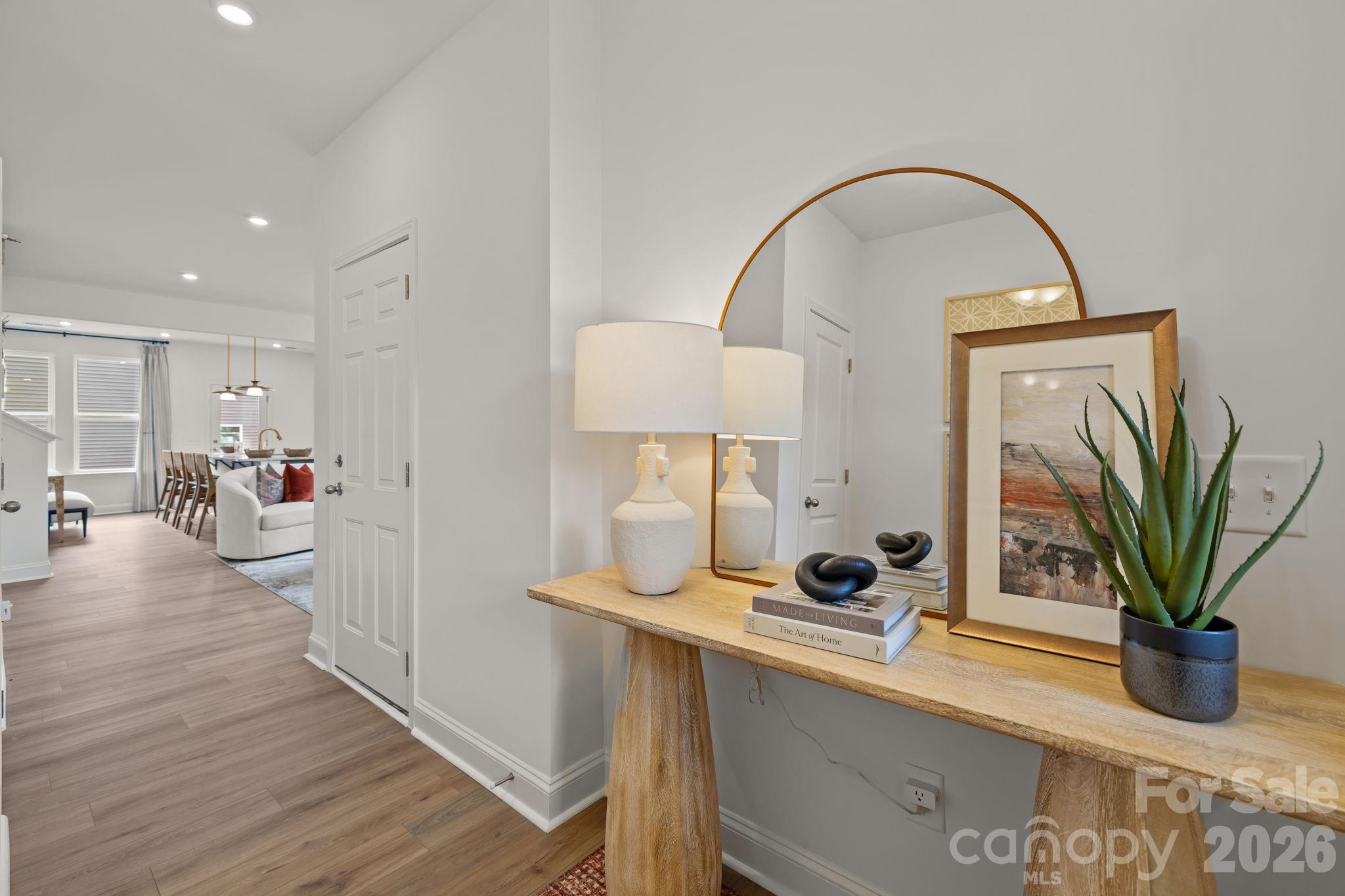 7709 Ethora Way Charlotte, NC 28216 - Photo 5 of 33 a view of living room with furniture and potted plant
