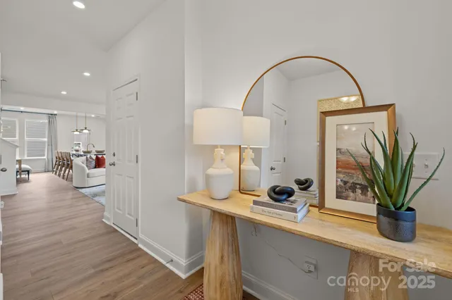 a view of a living room and entryway