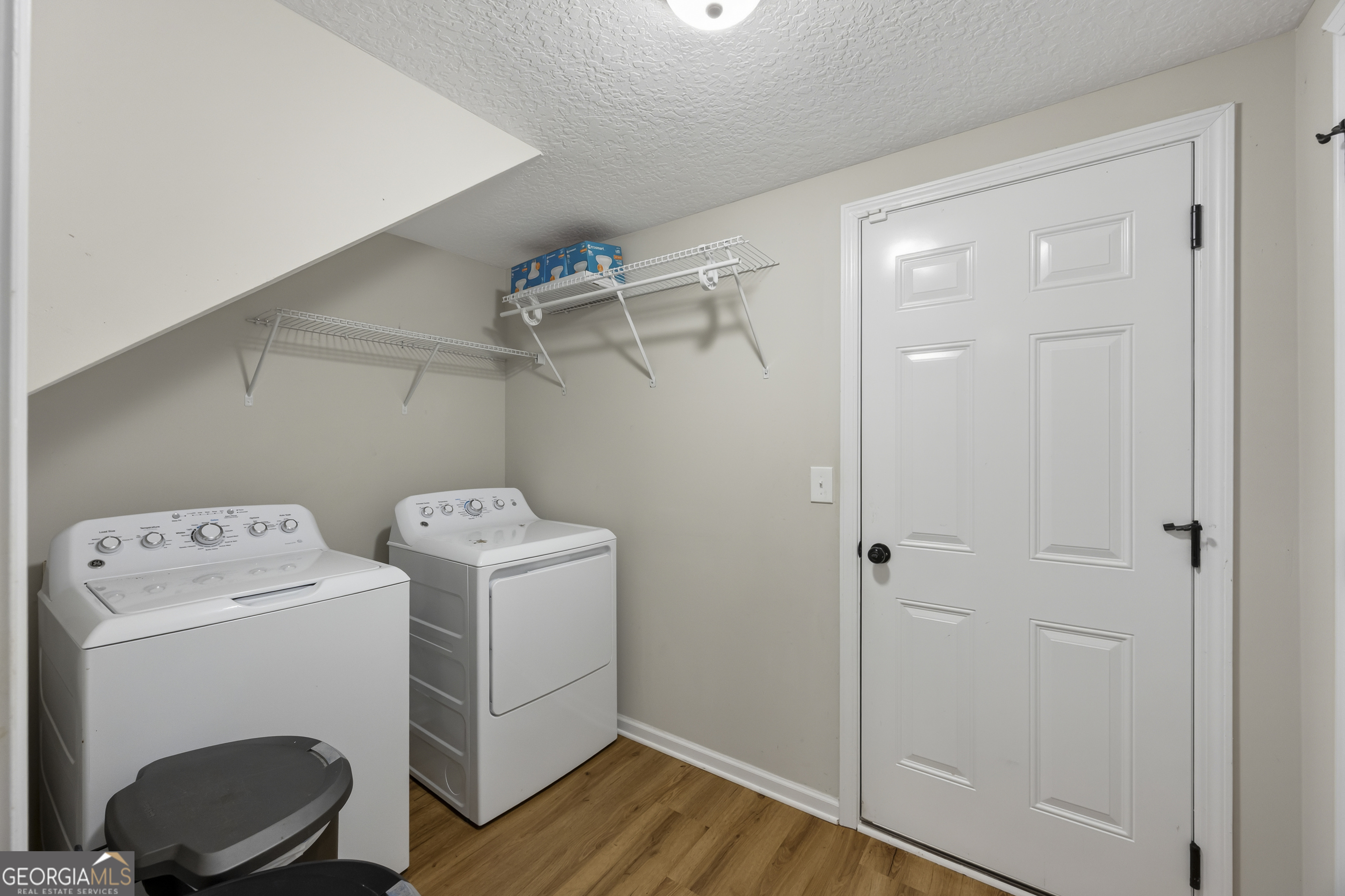 717 Oconee Lane Commerce, GA 30529 - Photo 32 of 57 a utility room with dryer and washer