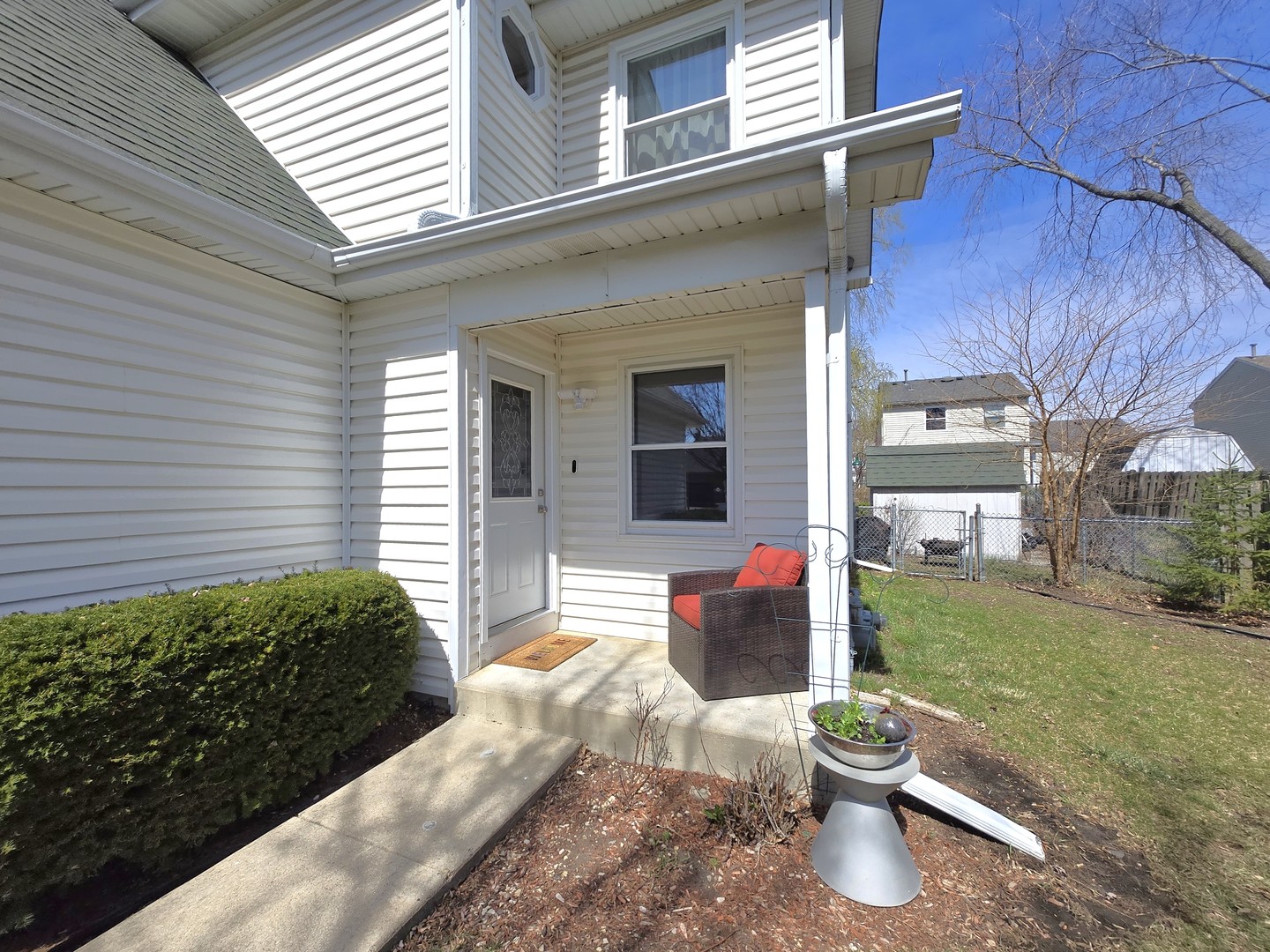 358 Westgate Terrace Streamwood, IL 60107 - Photo 2 of 39 a front view of a house with a yard