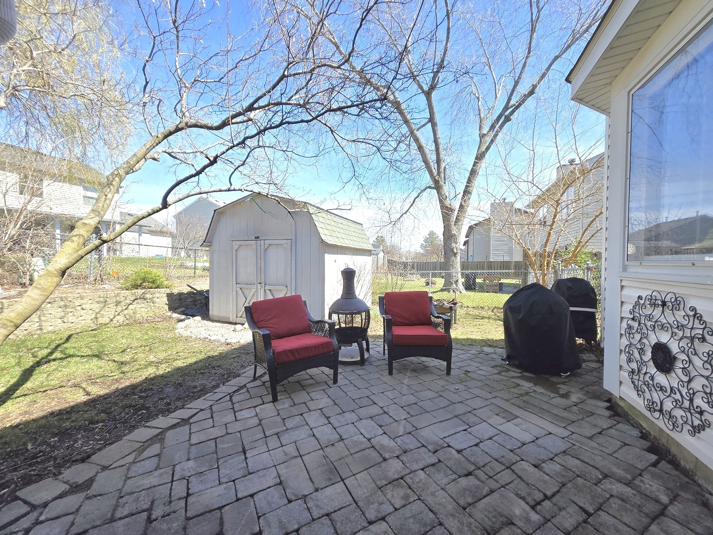 358 Westgate Terrace Streamwood, IL 60107 - Photo 35 of 39 a view of a chairs in patio of the house