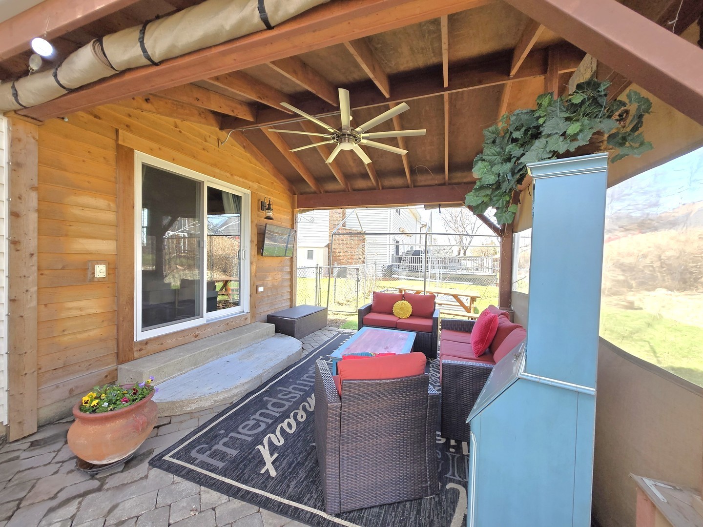 358 Westgate Terrace Streamwood, IL 60107 - Photo 37 of 39 a view of an outdoor dining space with a table and chairs