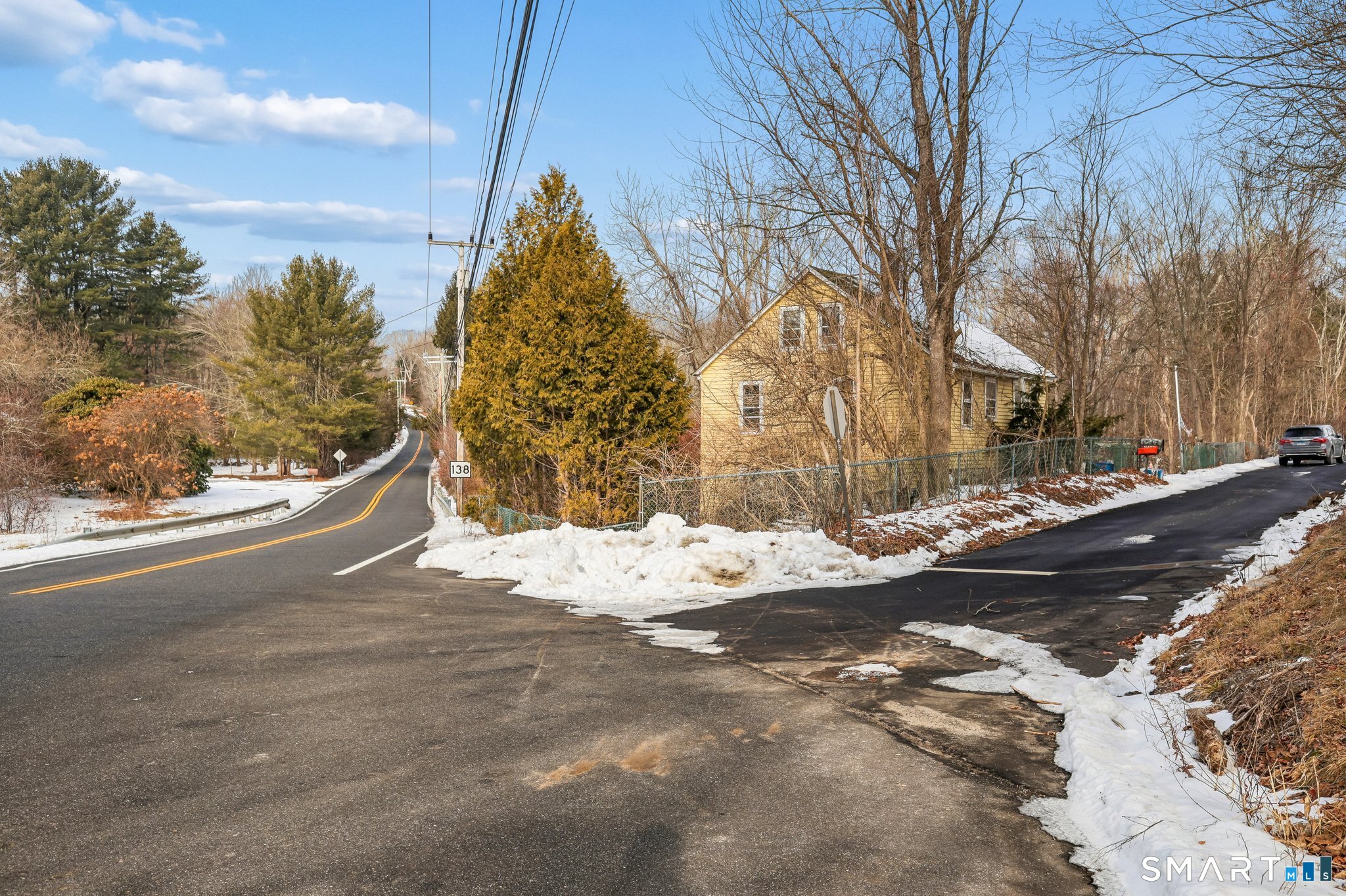 5 Town House Road Lisbon, CT 06351 - Photo 12 of 14 a view of a yard with snow on the road