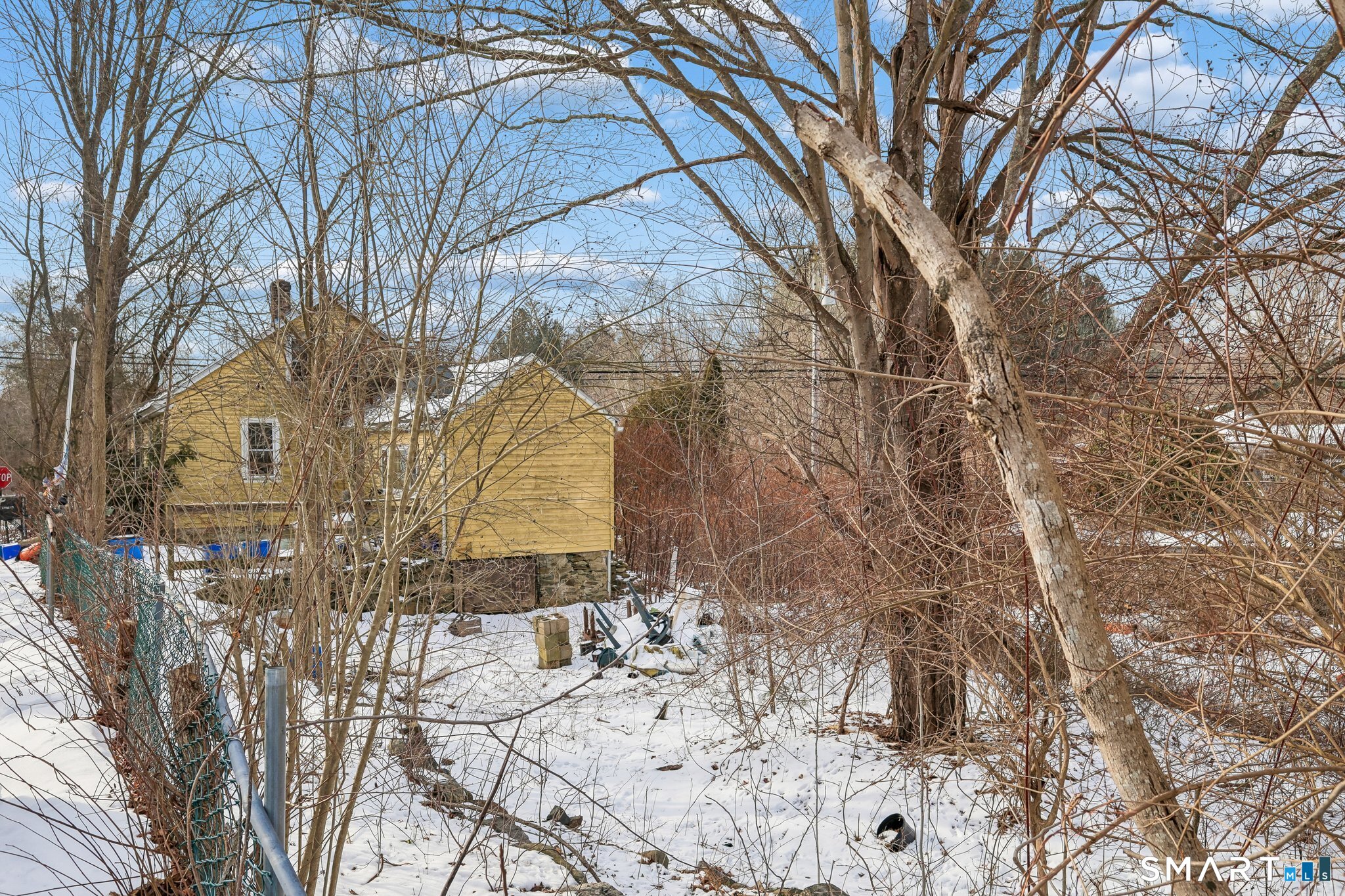 5 Town House Road Lisbon, CT 06351 - Photo 14 of 14 a backyard of a house with large trees