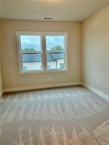 a view of a terrace with chairs