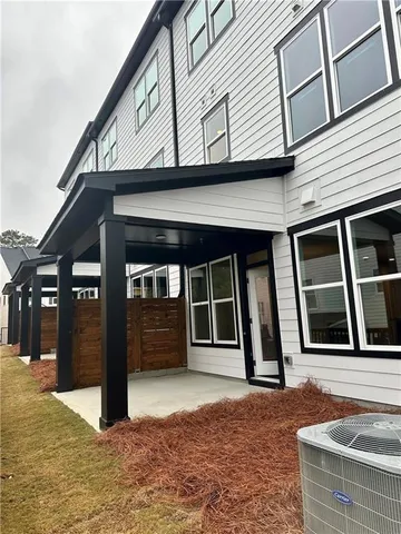 a view of a balcony with wooden fence