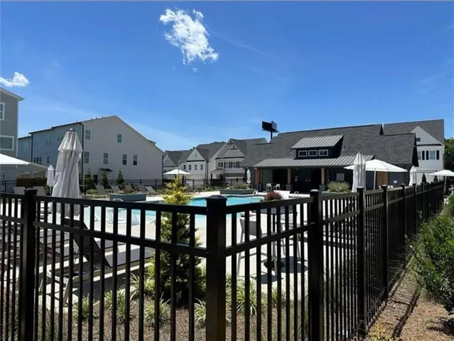 a view of a patio with swimming pool