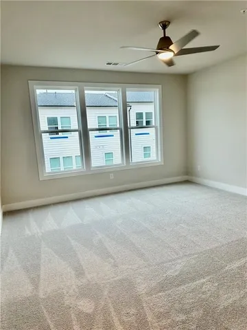 a bathroom with a tub and shower
