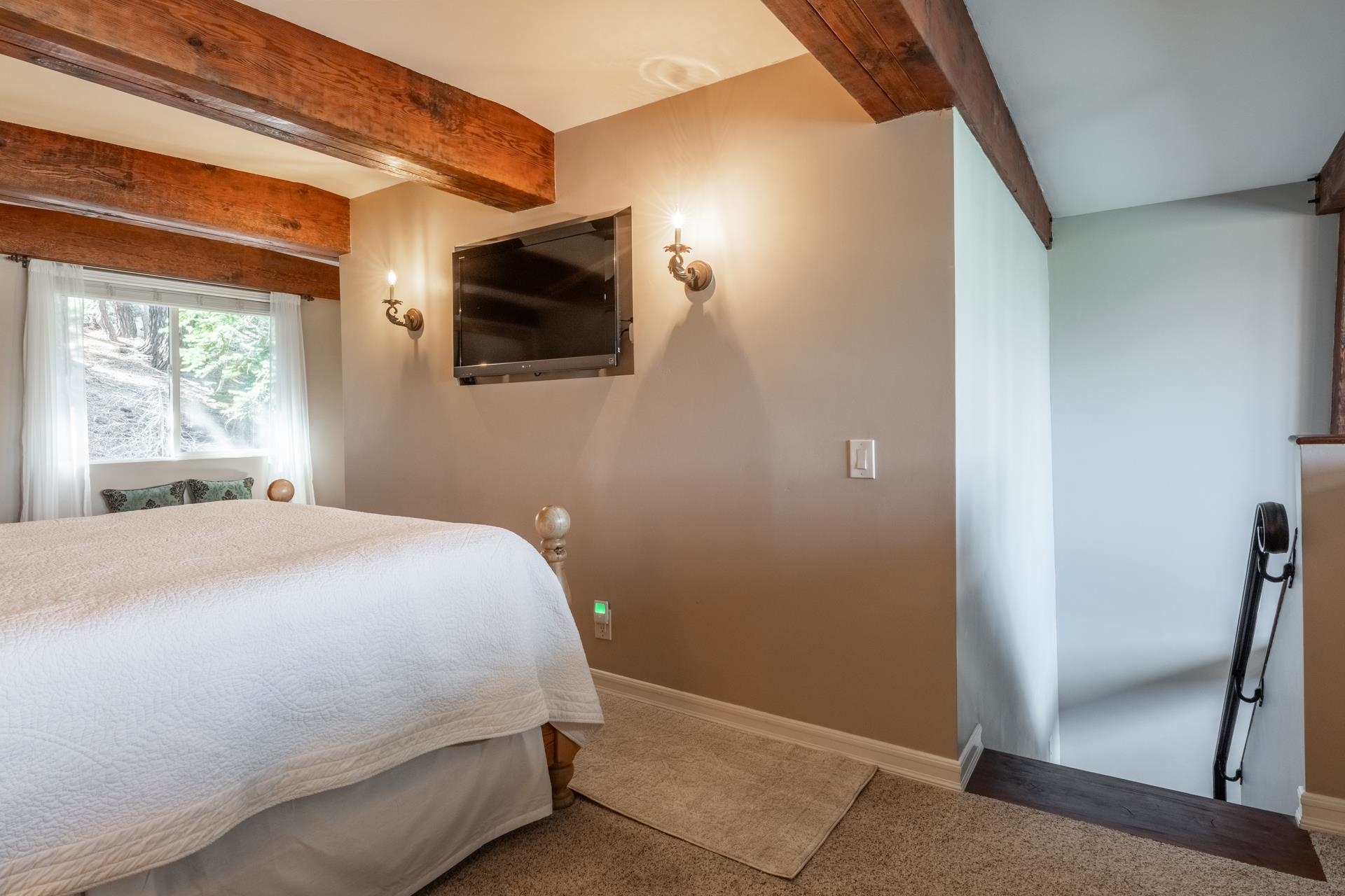 349 Davison Road, Unit 42 Mammoth Lakes, CA 93546 - Photo 17 of 43 a bedroom with a bed and a flat screen tv