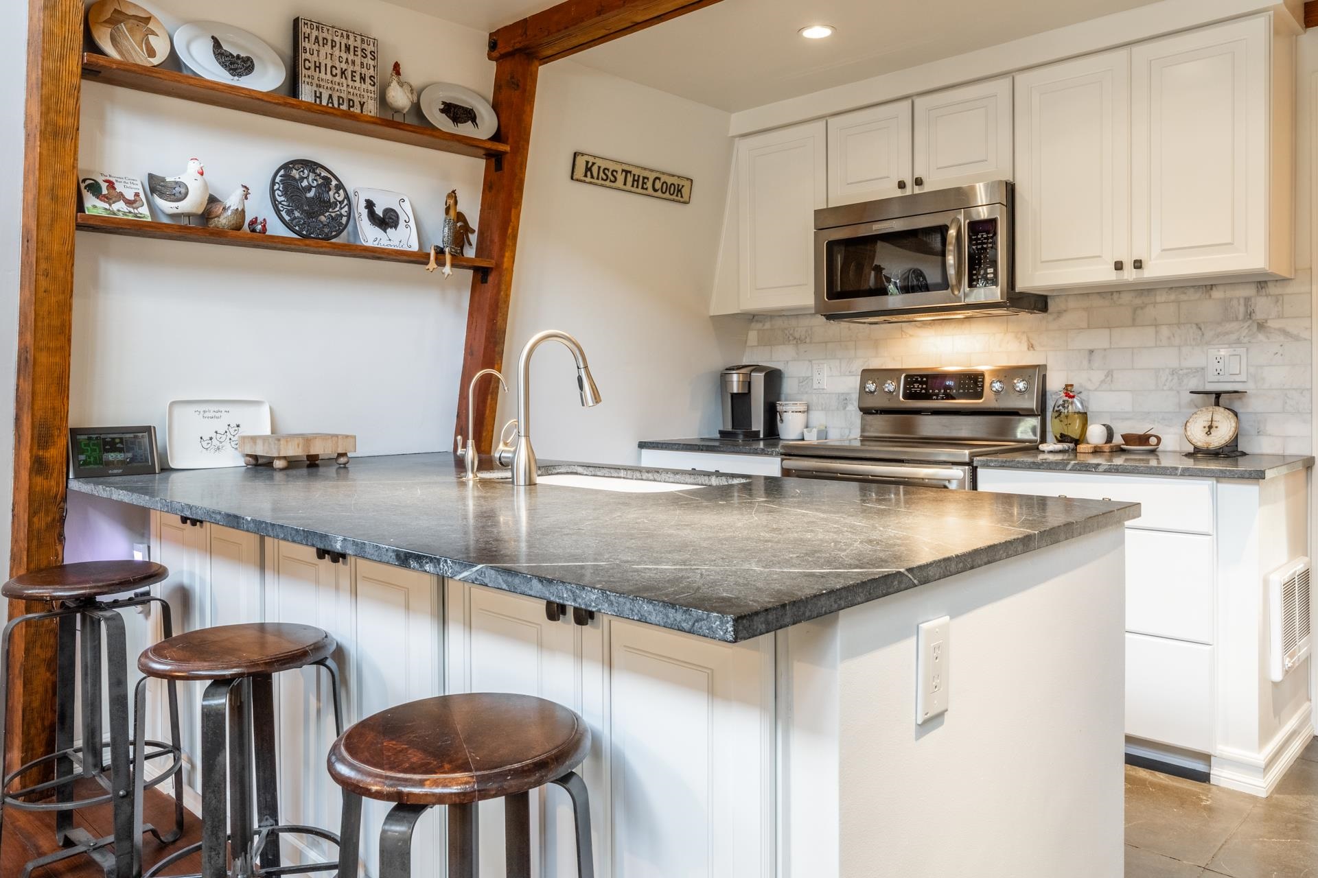 349 Davison Road, Unit 42 Mammoth Lakes, CA 93546 - Photo 9 of 43 a kitchen with stainless steel appliances granite countertop a sink a stove and cabinets