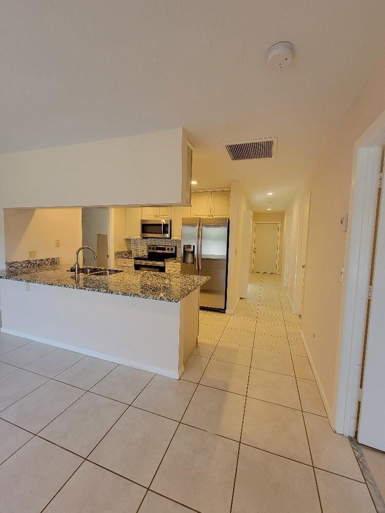 1087 Goldenrod Road Wellington, FL 33414 - Photo 6 of 15 20220309_094519_resized