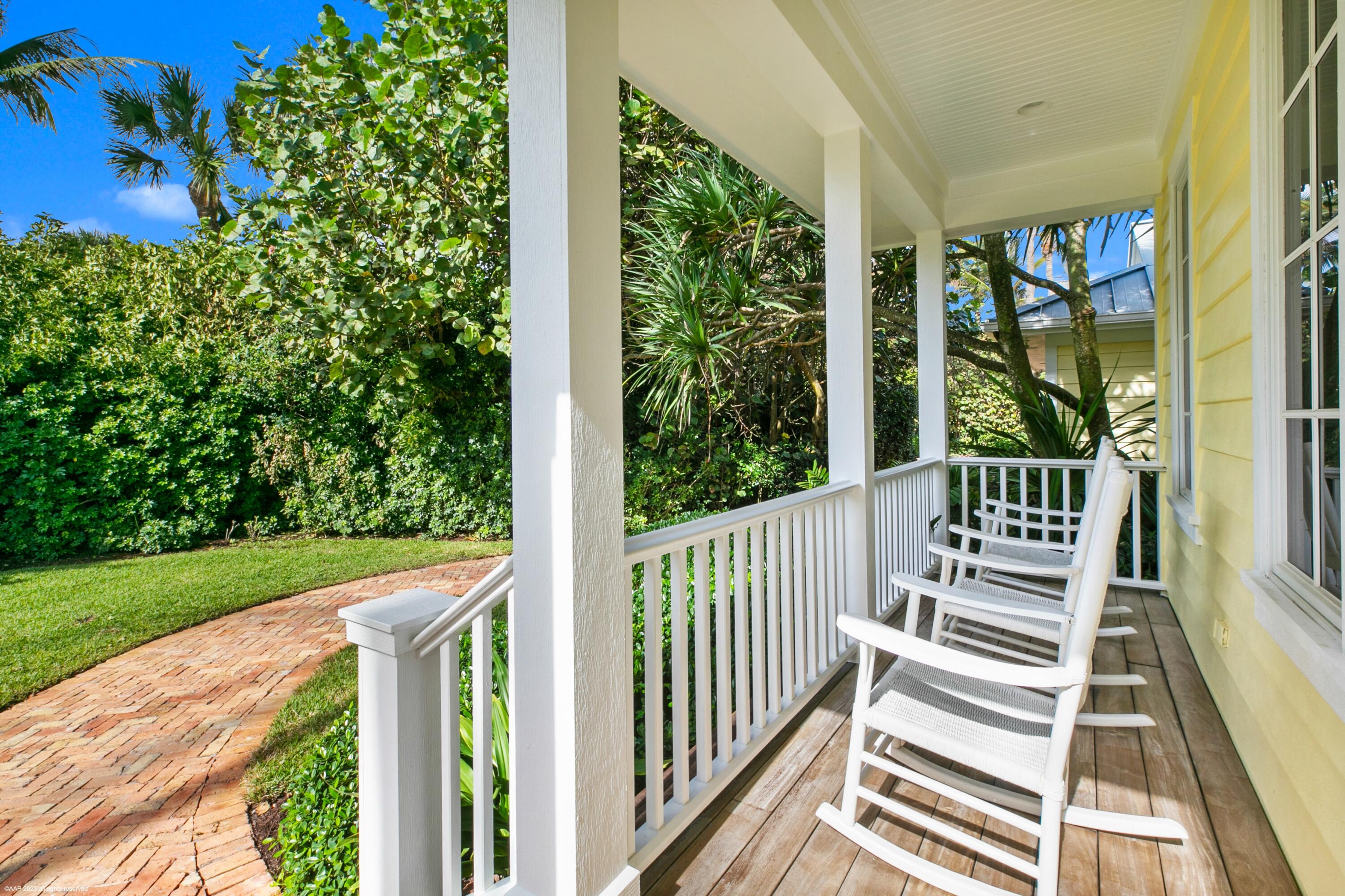107 North Beach Road Jupiter Island, FL 33455 - Photo 15 of 55 a view of a balcony with wooden floor