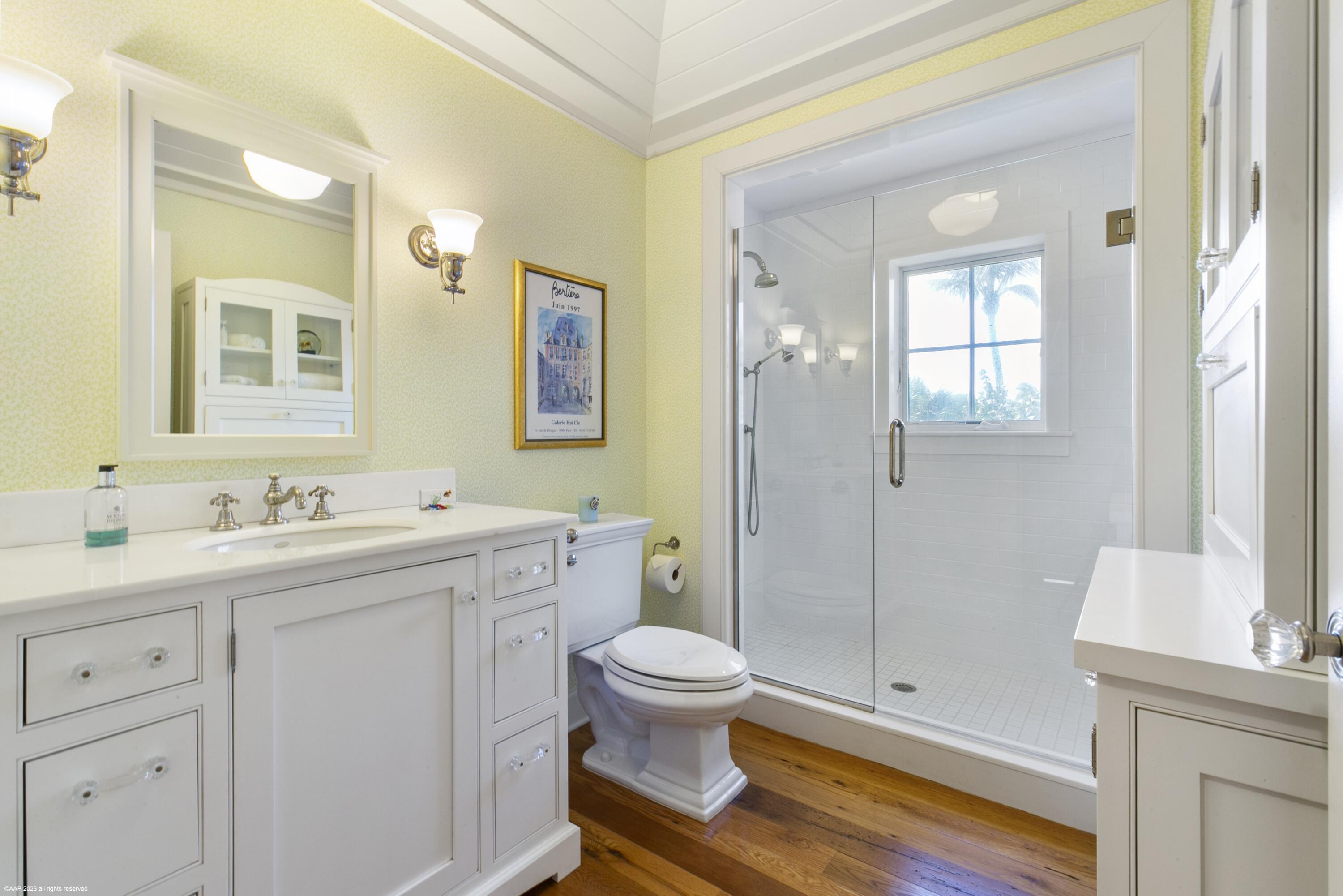 107 North Beach Road Jupiter Island, FL 33455 - Photo 30 of 55 a bathroom with a sink a toilet and shower