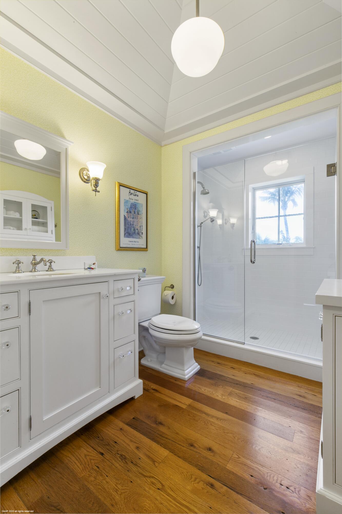 107 North Beach Road Jupiter Island, FL 33455 - Photo 31 of 55 a bathroom with a sink and a mirror