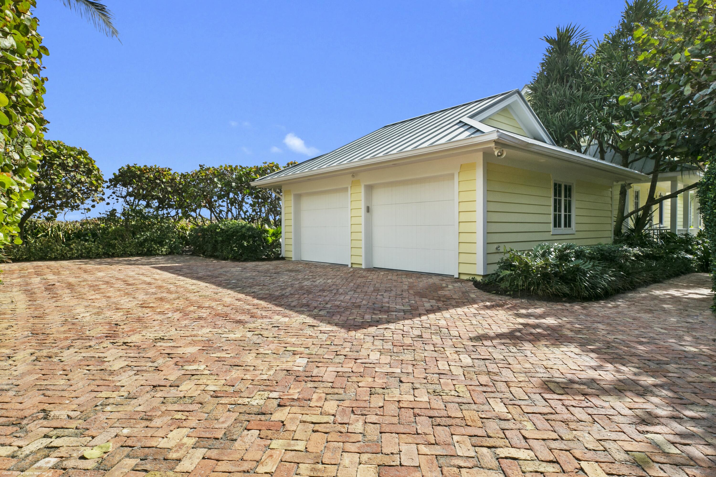 107 North Beach Road Jupiter Island, FL 33455 - Photo 38 of 55 a view of backyard of house with green space