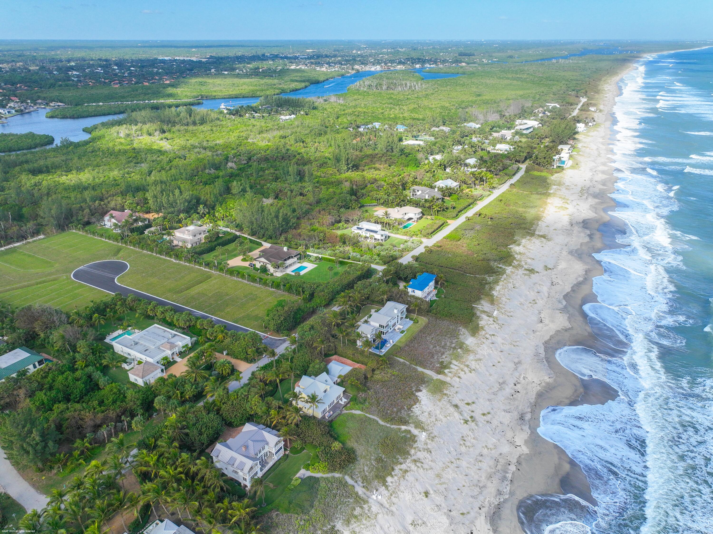 107 North Beach Road Jupiter Island, FL 33455 - Photo 8 of 55 a city view with lake view
