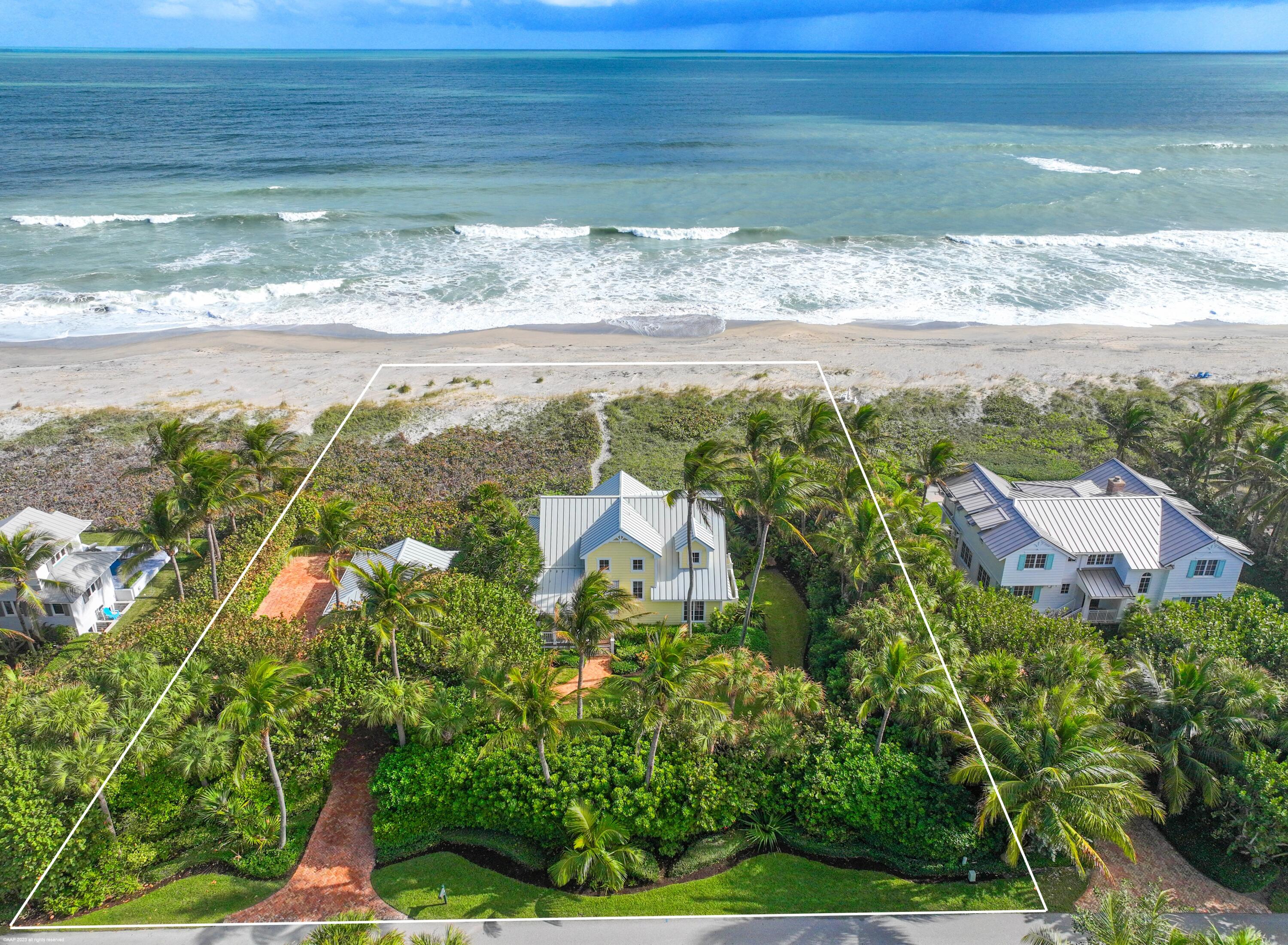 107 North Beach Road Jupiter Island, FL 33455 - Photo 10 of 55 a view of a lake from a balcony