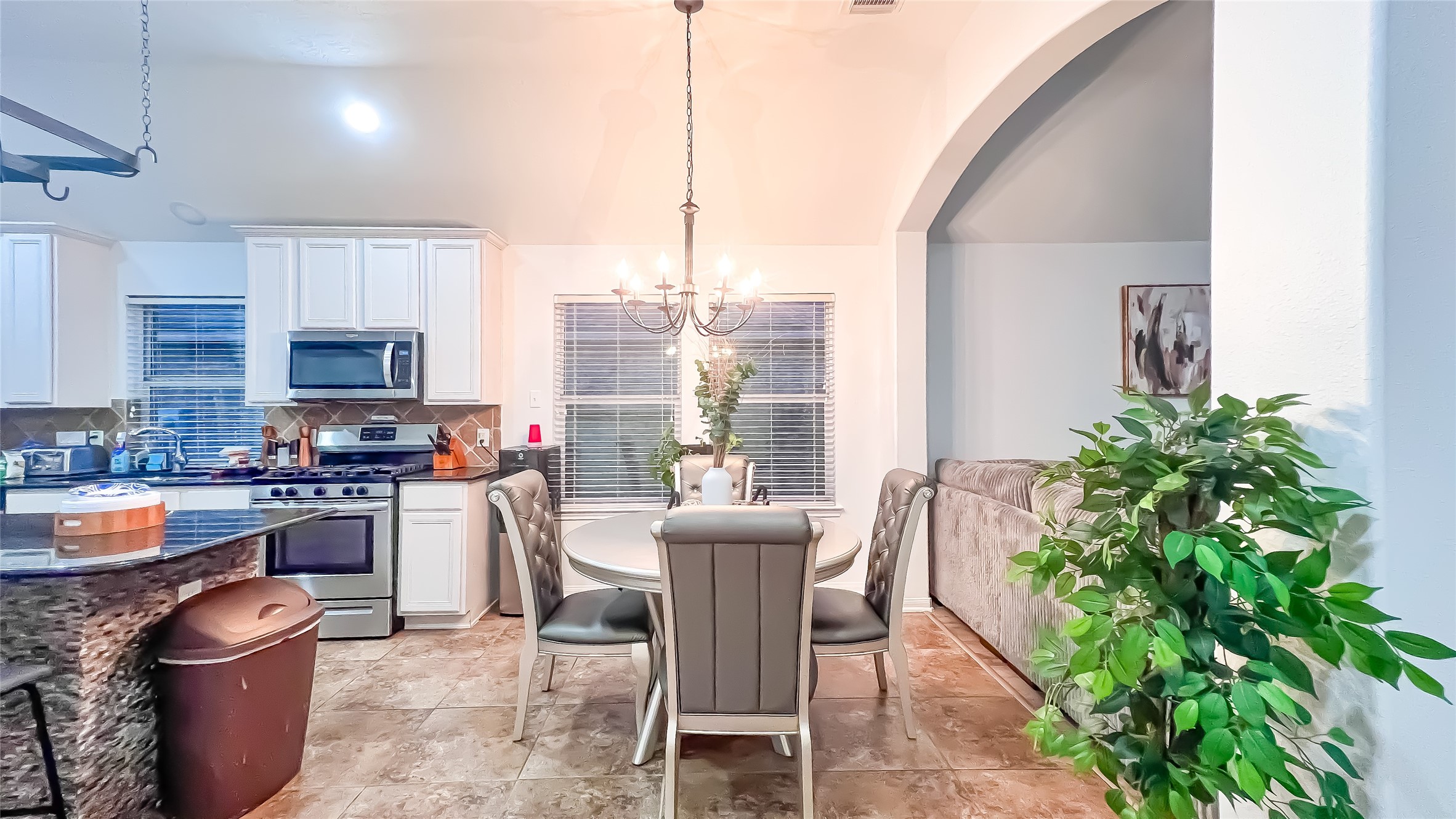 9923 Opal Rock Drive Rosharon, TX 77583 - Photo 5 of 20 a view of a dining room with furniture window and wooden floor