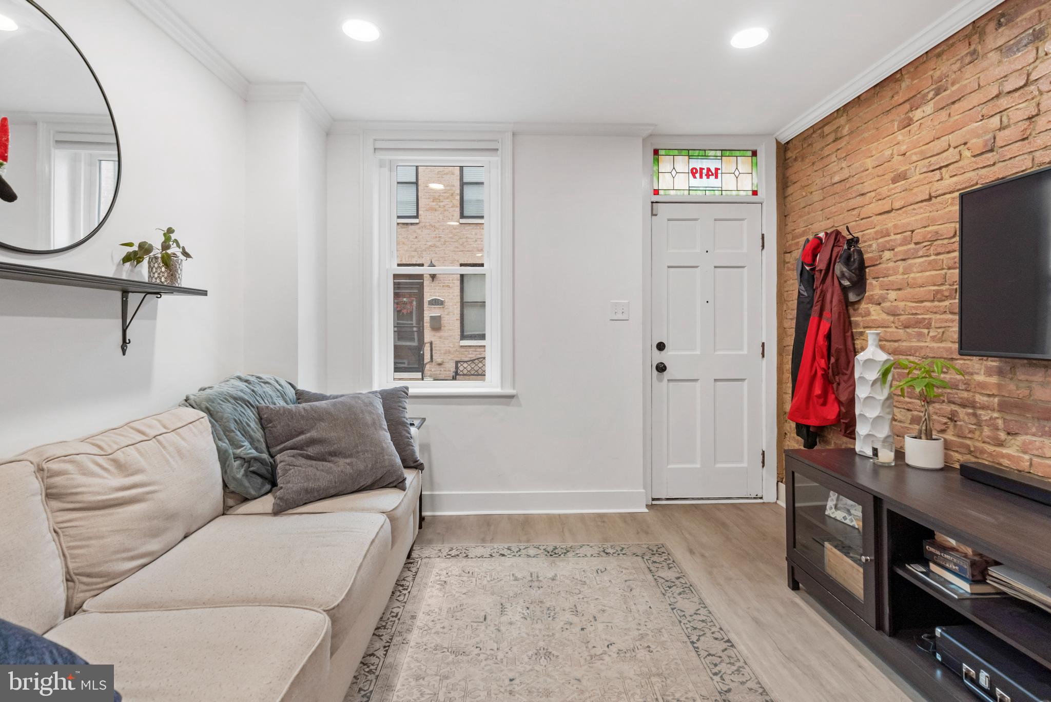 1419 Cooksie Street Baltimore, MD 21230 - Photo 3 of 28 Classic Brick Wall & New Recessed Lightning