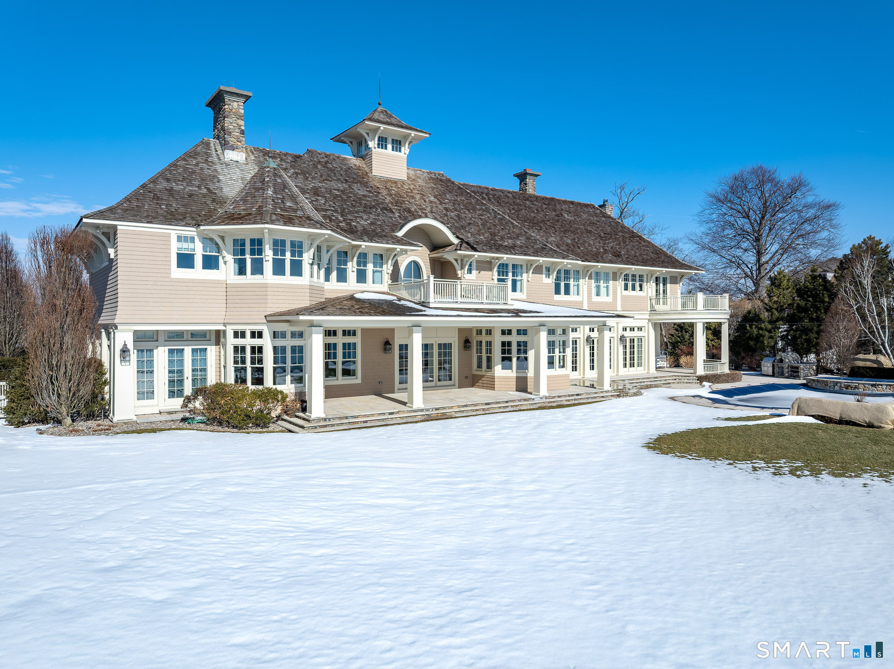 10 Shorehaven Road Norwalk, CT 06855 - Photo 15 of 33 a view of a house with swimming pool and sitting area