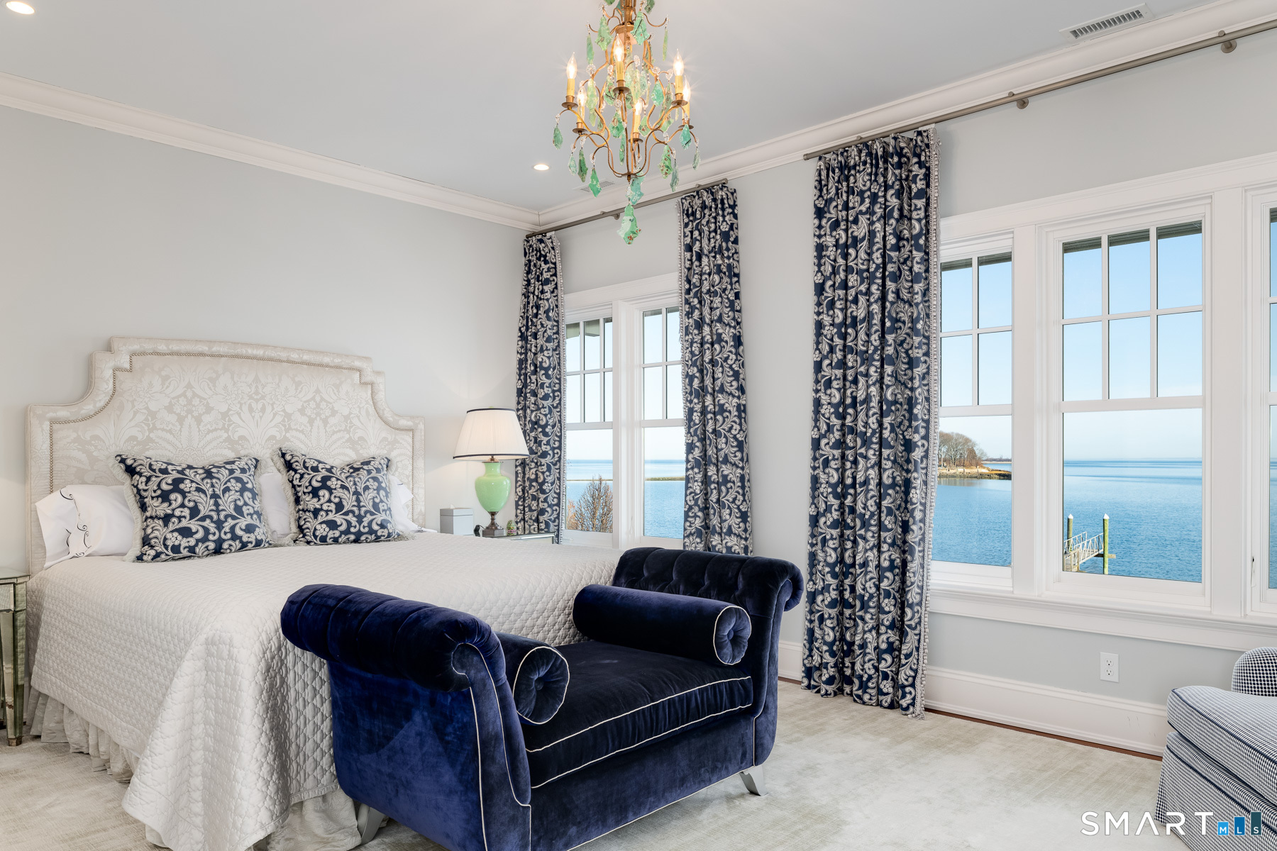 10 Shorehaven Road Norwalk, CT 06855 - Photo 21 of 33 a bedroom with furniture and a large window