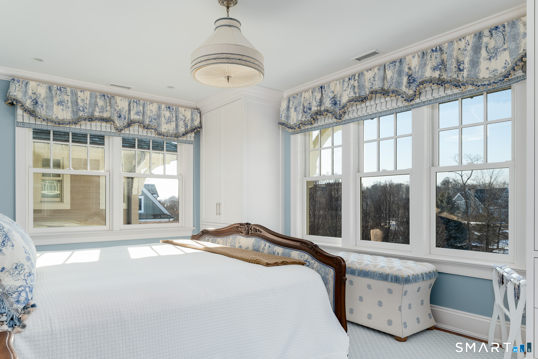 10 Shorehaven Road Norwalk, CT 06855 - Photo 23 of 33 a bedroom with a large bed and a large window