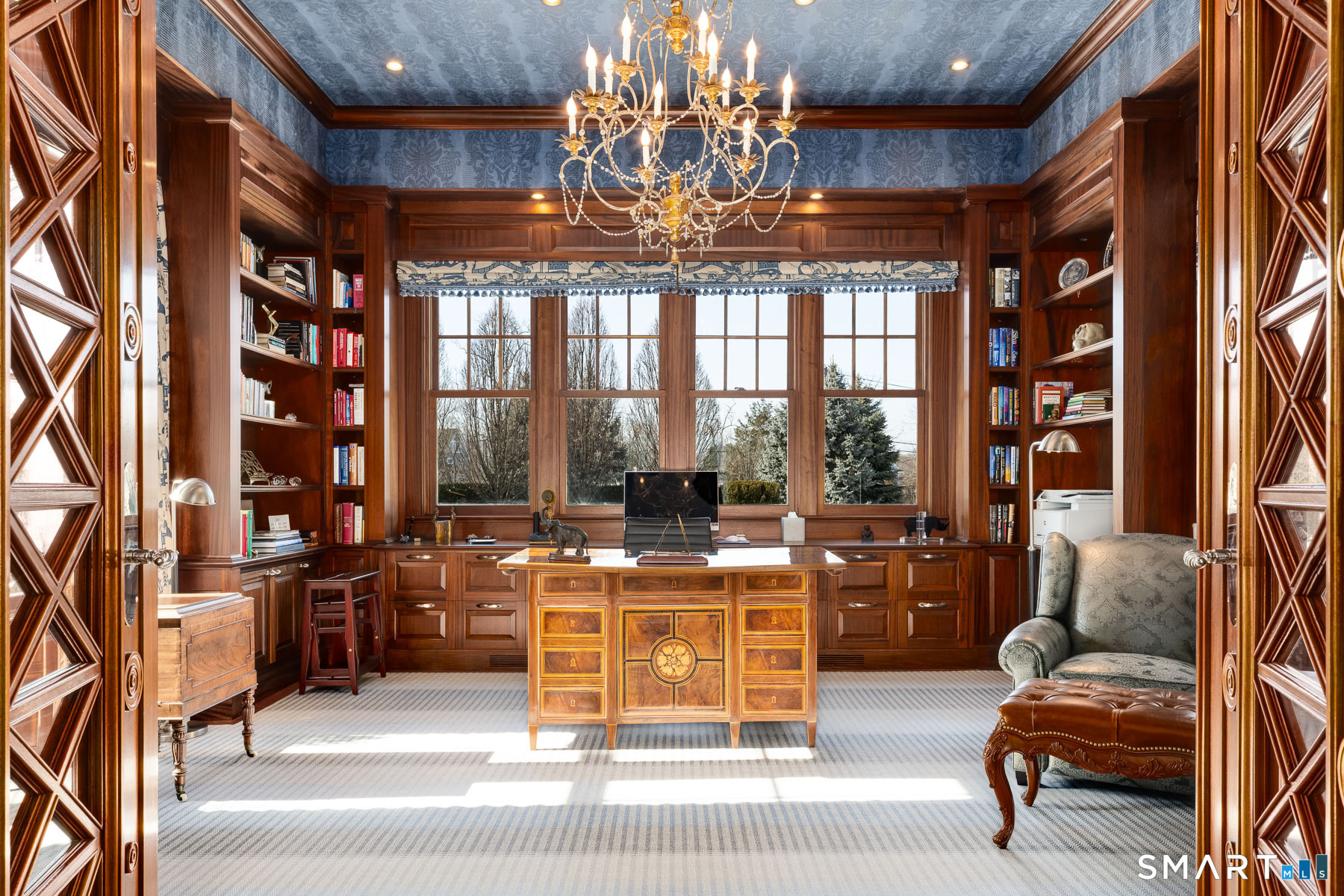 10 Shorehaven Road Norwalk, CT 06855 - Photo 6 of 33 a living room with furniture and a chandelier