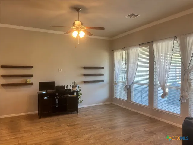 a view of a livingroom with furniture