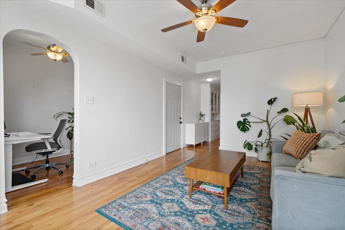 2735 North Ridgeway Avenue Chicago, IL 60647 - Photo 4 of 40 a living room with furniture and wooden floor