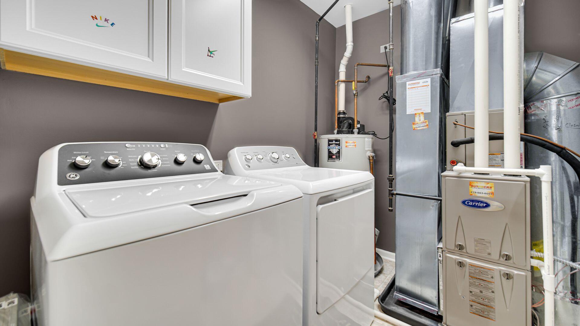 11175 Vermont Circle Crown Point, IN 46307 - Photo 16 of 22 a utility room with dryer and washer