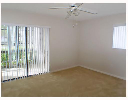 7751 Ashmont Circle, Unit 7751 Tamarac, FL 33321 - Photo 5 of 16 Master Bedroom