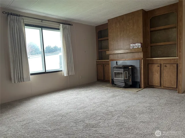 a view of room with cabinets