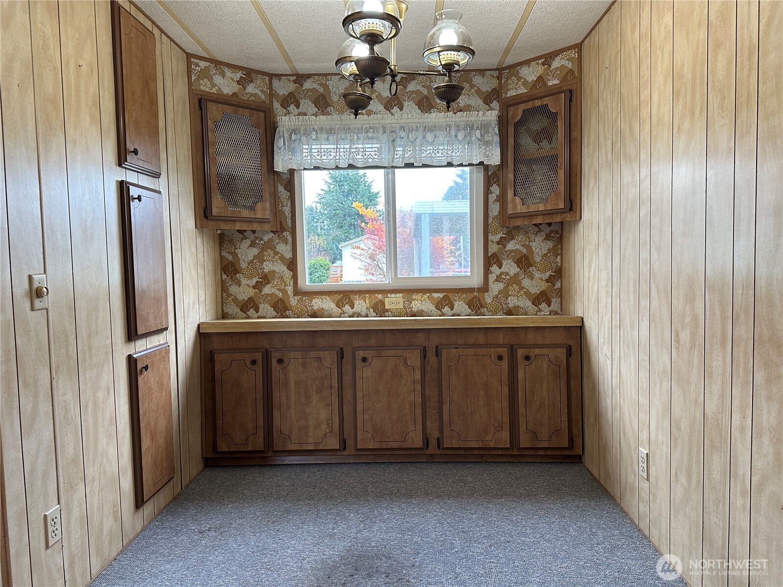 57 Clemons Road, Unit 49 Montesano, WA 98563 - Photo 15 of 23 a bathroom with a granite countertop sink a window and a mirror