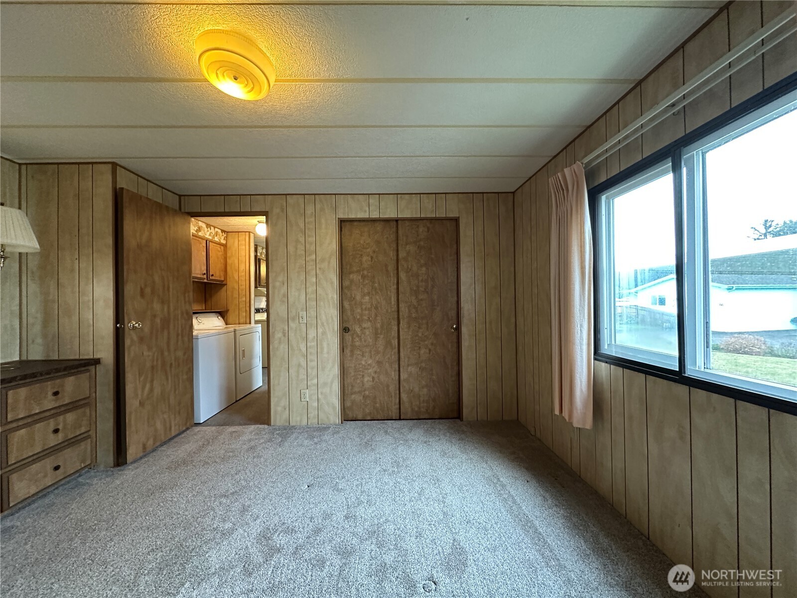 57 Clemons Road, Unit 49 Montesano, WA 98563 - Photo 17 of 23 a view of empty room with wooden floor