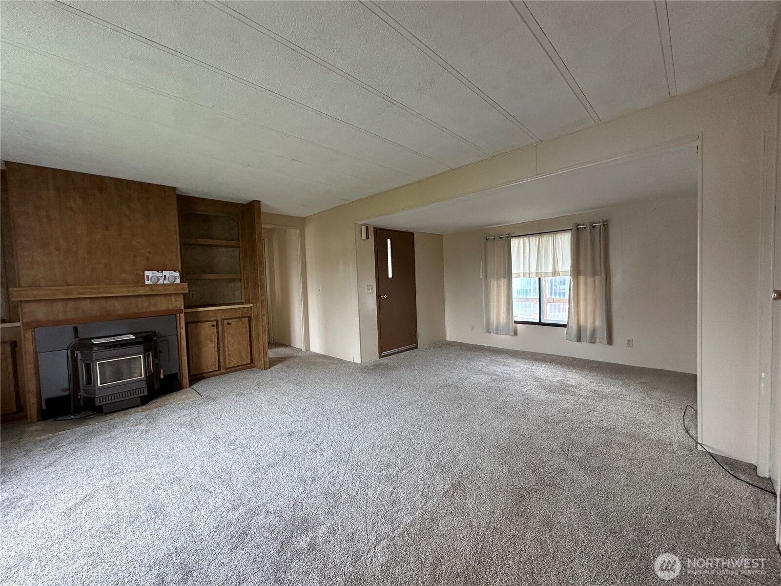 57 Clemons Road, Unit 49 Montesano, WA 98563 - Photo 8 of 23 a view of an empty room with a window