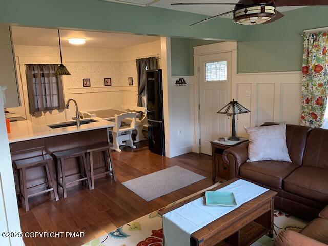 1164 Upper Seese Hill Road Canadensis, PA 18325 - Photo 5 of 12 a living room with furniture a wooden floor and next to a window