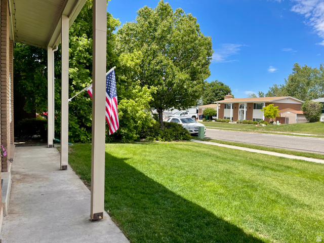 2444 Quail Run Drive Sandy, UT 84093 - Photo 21 of 23 Front porch view to street