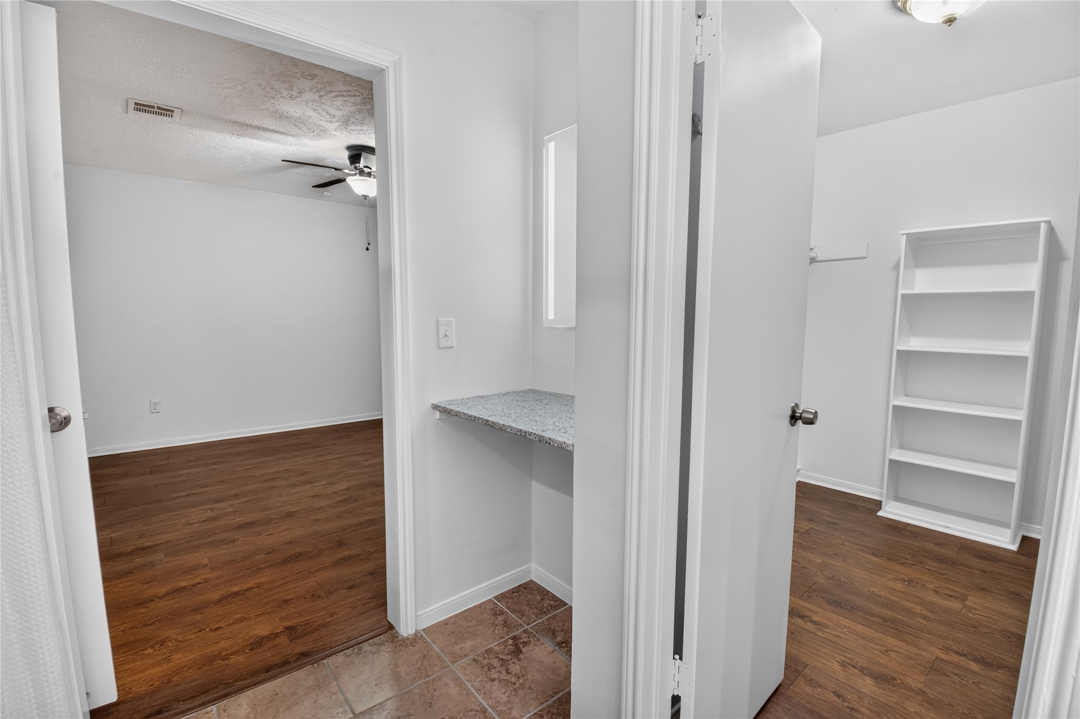 25223 Lynbriar Lane Spring, TX 77373 - Photo 15 of 32 Designed for easy organization, this spacious walk-in closet includes shelves and plenty of room for clothing, shoes, and accessories.